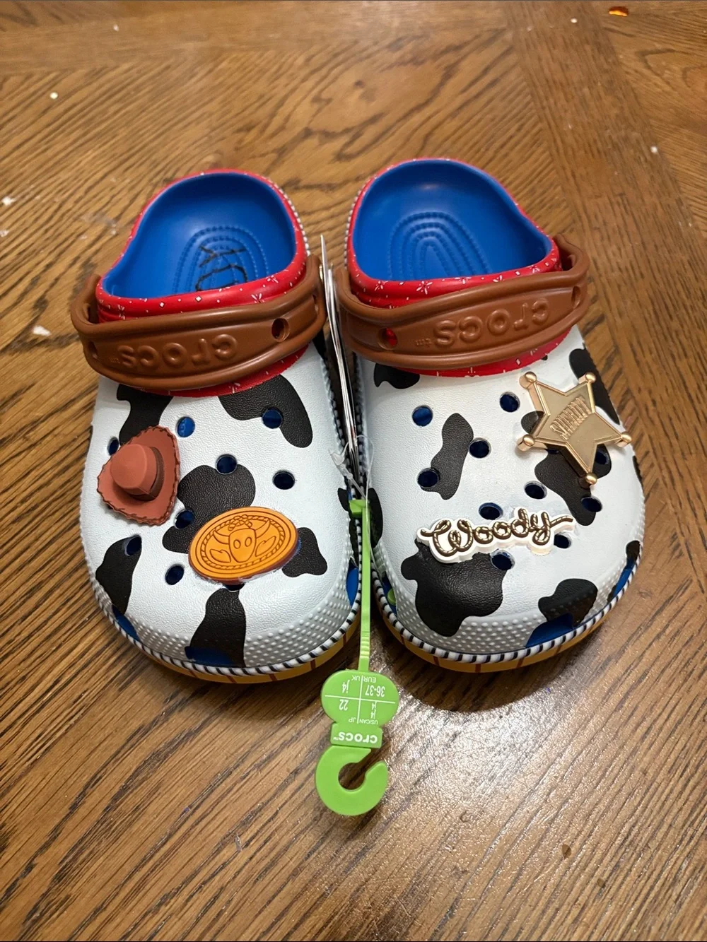 CROCS Kids Cow-Print Clogs with Blue Footbed and Brown Strap